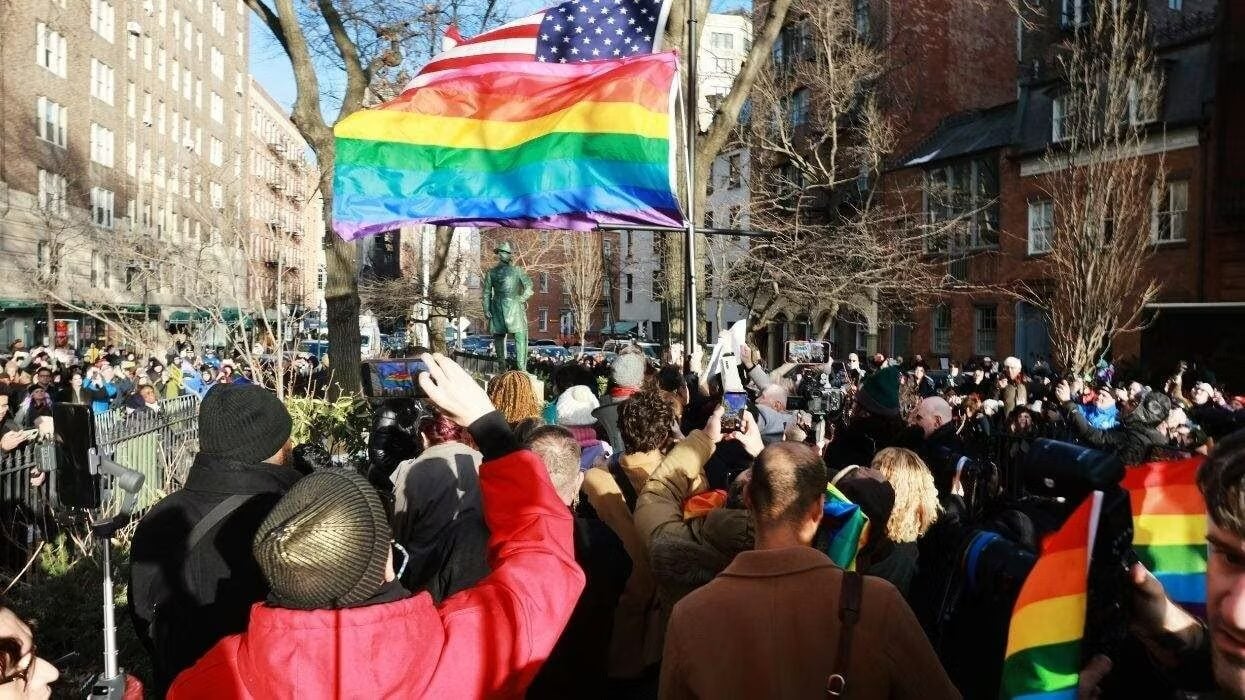 pride-flag-and-a-crowd-of-people-at-the-stonewall-national-monument